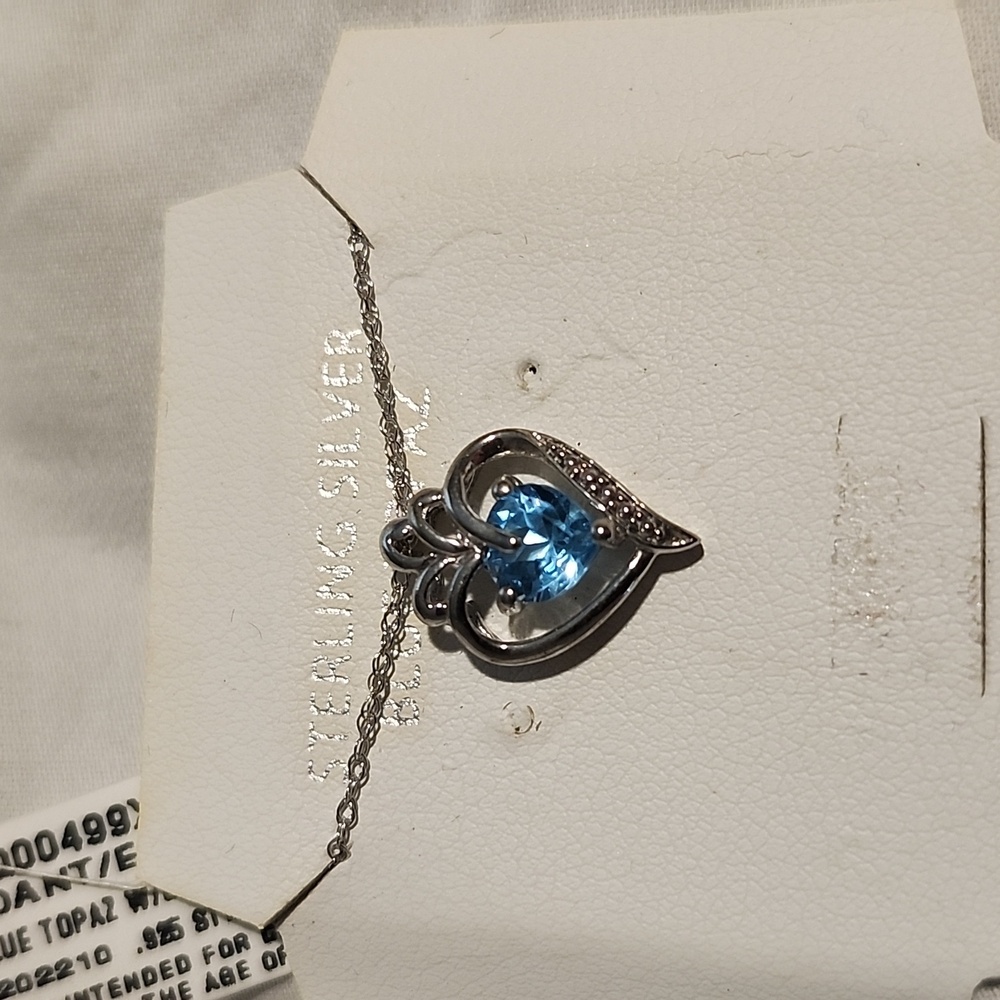 Sterling silver blue topaz neart necklace